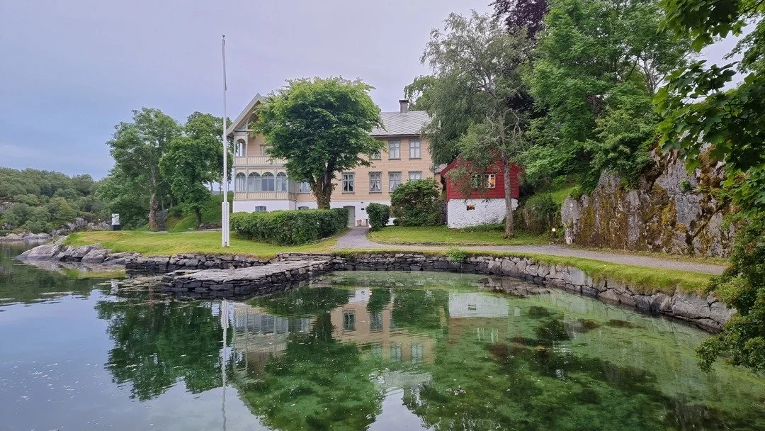 The historic quayside buildings at Skjærjehamn